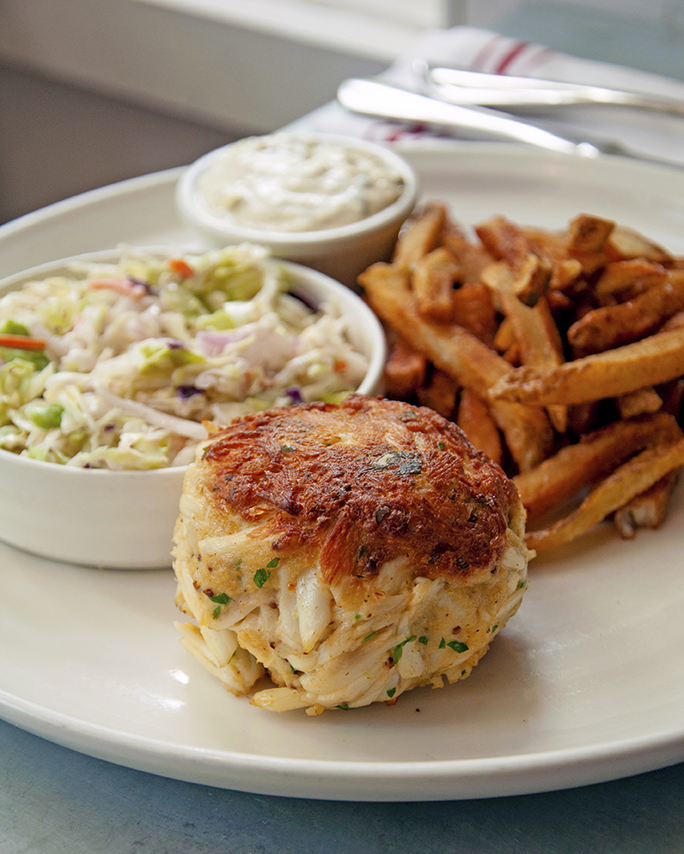 Jumbo lump crab cake with coleslaw and fries